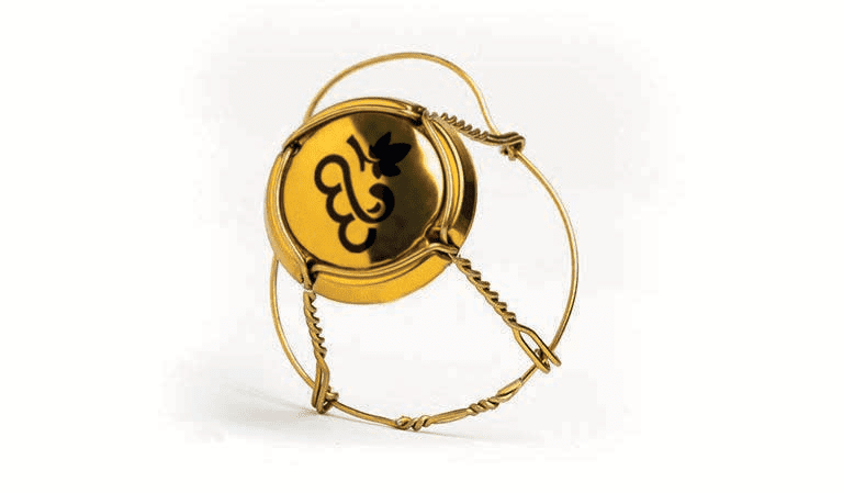 Golden champagne muselet wire cage with a logo on the cap.