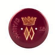 A maroon cricket ball with a golden crown and logo.